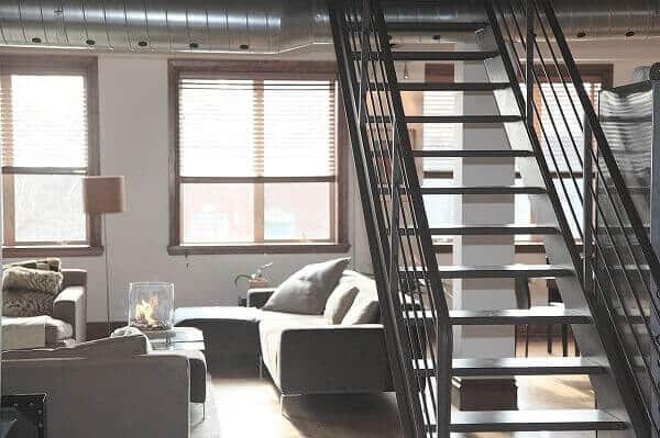 A living room with a staircase