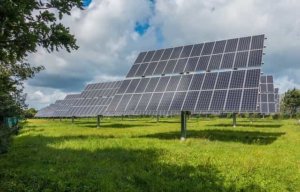 A large solar panel system on the field.